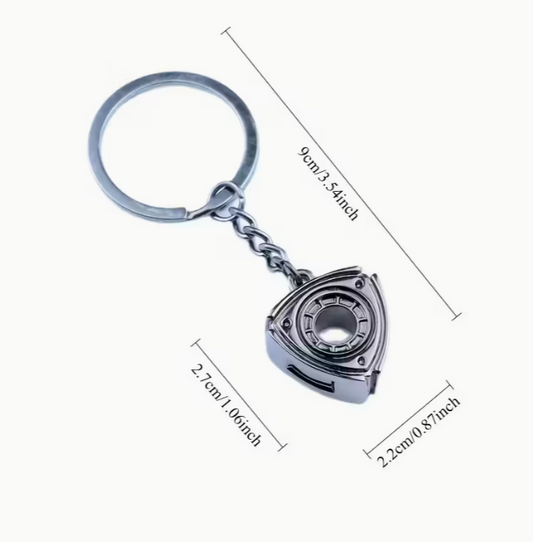 A Keychain Featuring a Rotating Engine Model